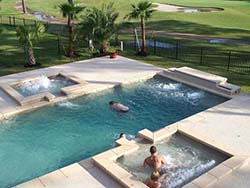 Design Builder Pro Swimming Inground Pool Contractor Flour Bluff Texas Freer Fiberglass Pools Aquamarine Installer creating an oasis